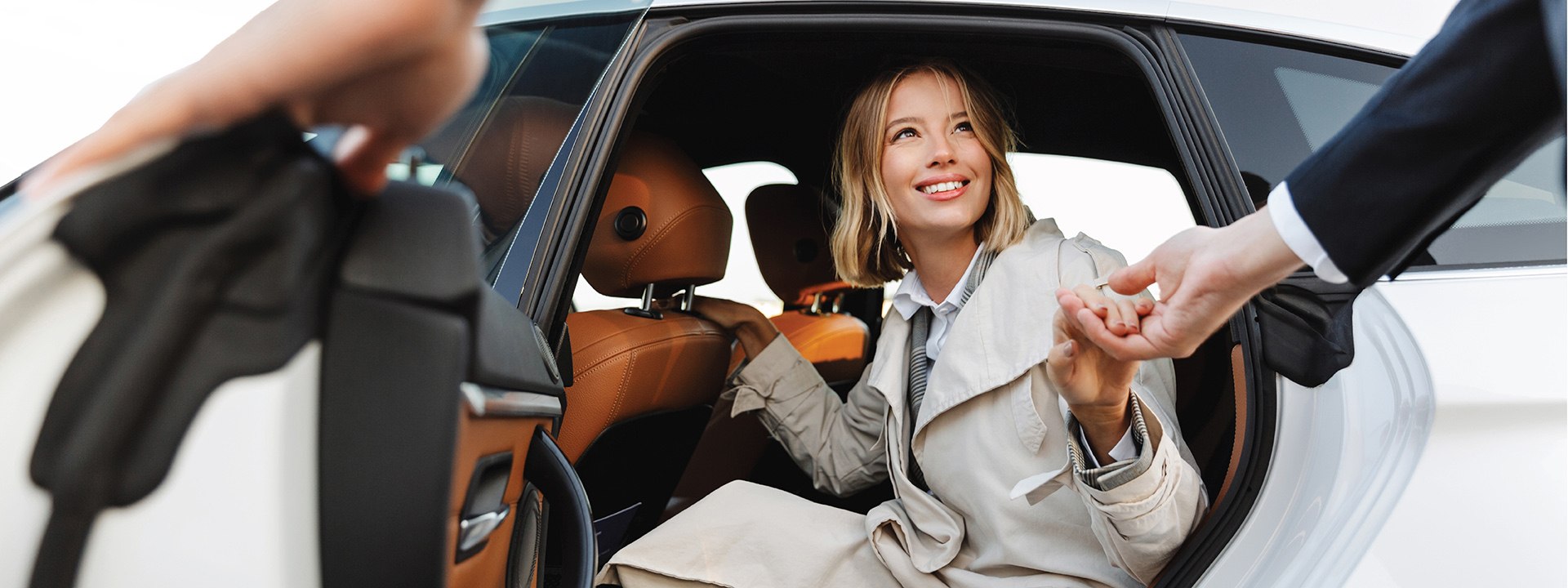 A woman getting out of the car